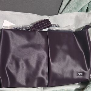 LUG HALF PLUNGE PLUM Bag CROSSBODY. NWT NON SMOKING/PET FRIENDLY HOME.